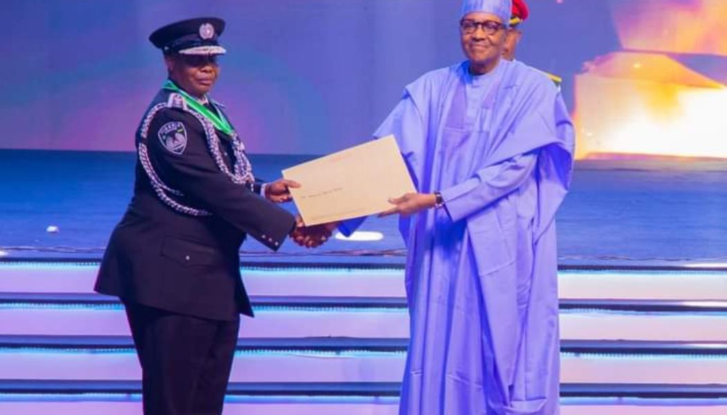 President Buhari honours Police IG