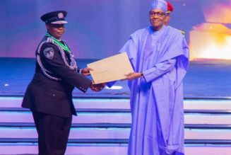 President Buhari honours Police IG