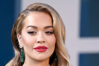 Rita Ora Showcases Lower Hip Tattoo in Extreme Cutout Jeans and Denim Crop Top
