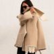 Scarf Coats Are the Only Coat Style Fashion People Are Investing in This Season