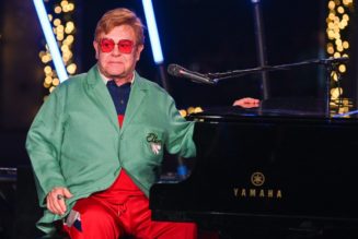 Elton John & His Family Ring In the Holidays With Saks Fifth Avenue Window Reveal