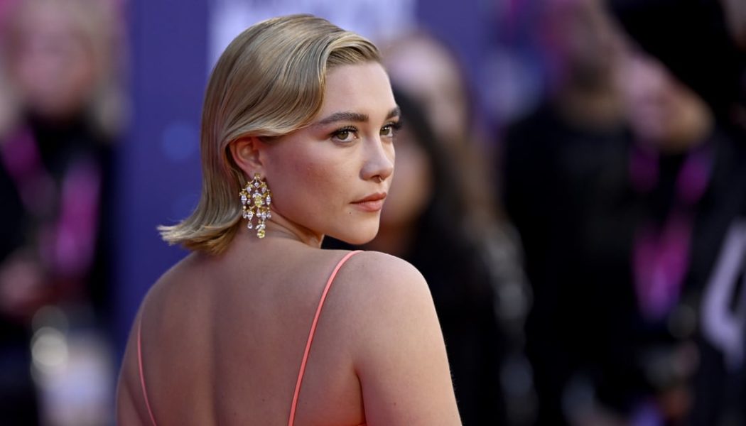 Florence Pugh Oozes Elegance in a See-Through White Dress with Wet-Look Hair
