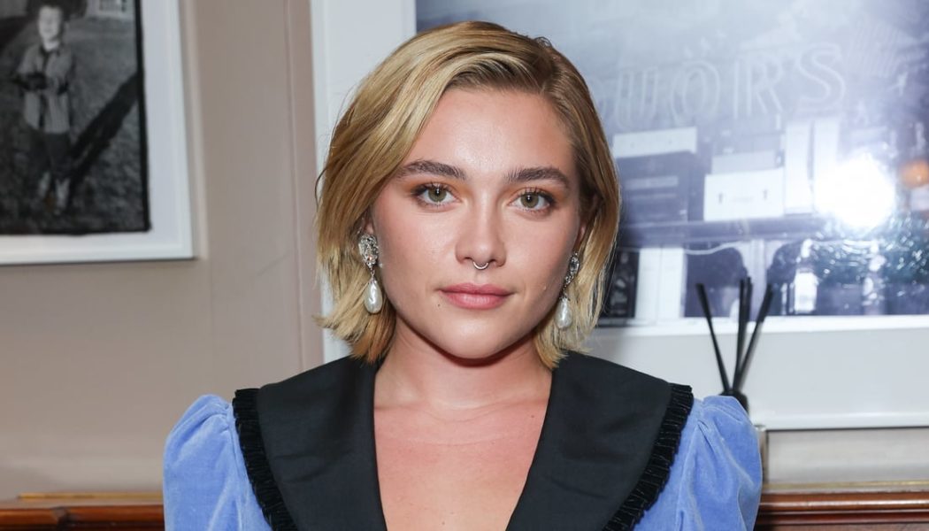 Florence Pugh Brings the Drama in a Silk Slip Dress with Thigh-High Slit and Ruffled Cape