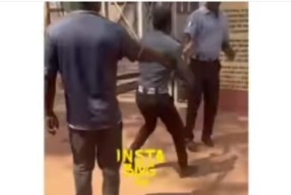 Godfrey Okeye university security guard captured flogging his female colleague
