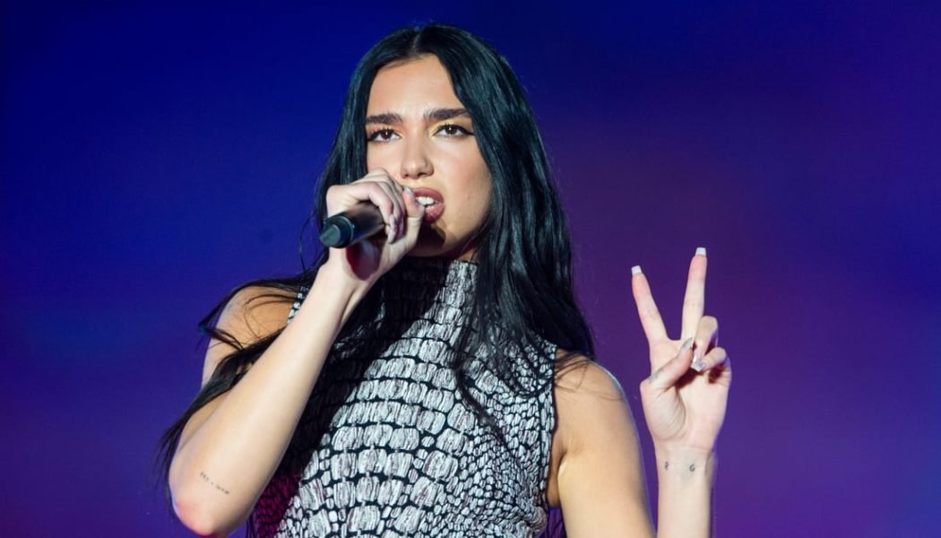 Dua Lipa’s Cheeky NYE Outfit Included a Sparkling Minidress and Exposed Thong