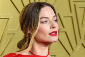 Margot Robbie’s Backless Caped Gown Deserves to Be Seen From Every Angle