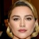 Florence Pugh Is Bringing the Peplum Back in a Red Corseted Gown and Puss in Boots Hat