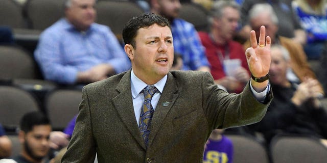 Assistant coach Greg Heiar signals to his players during the first round of the NCAA basketball tournament against the Yale Bulldogs at the VyStar Veterans Memorial Arena March 21, 2019, in Jacksonville, Fla.
