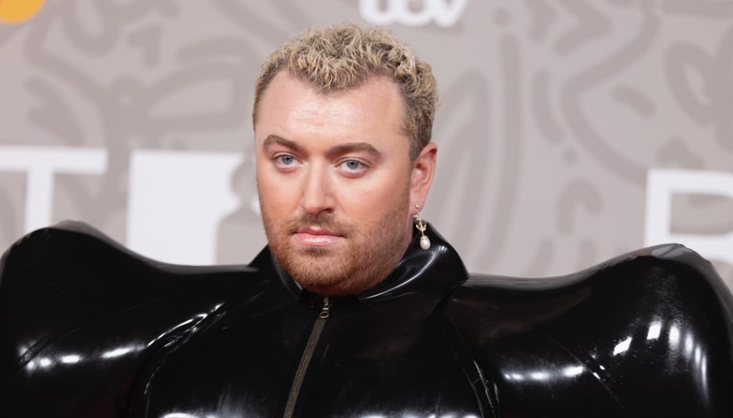 Sam Smith Arrives at the 2023 Brits in an Inflatable Latex Jumpsuit