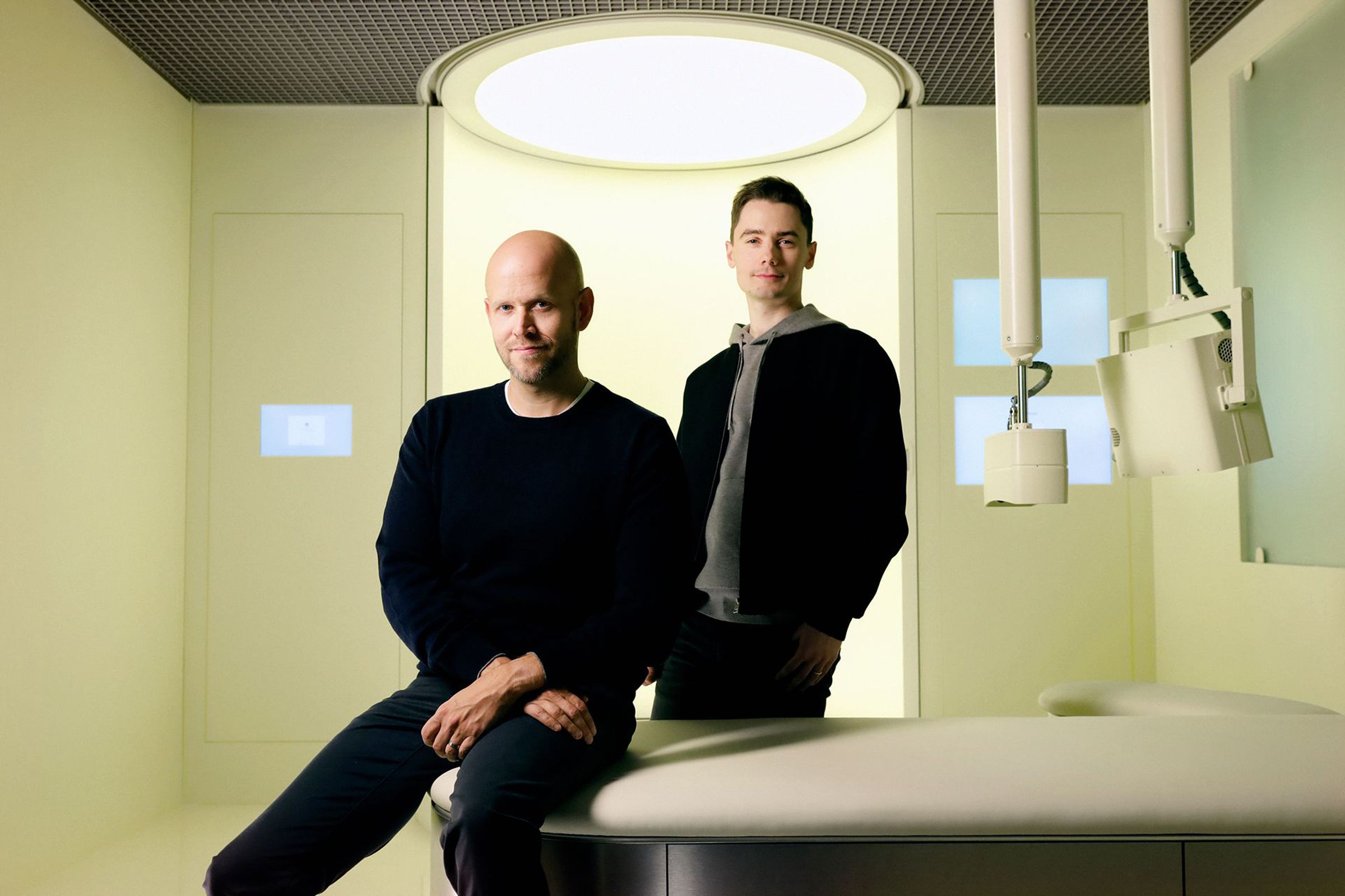 Daniel Ek and Hjalmar Nilsonne next to Neko Health’s body scanner.