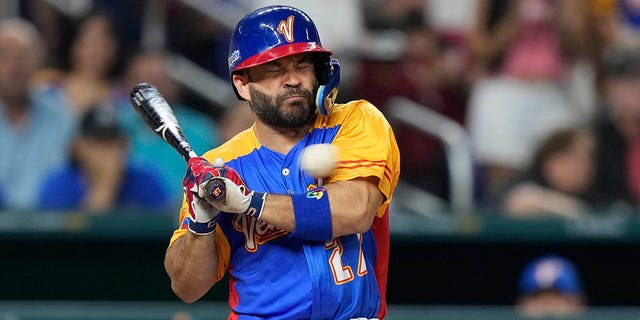 Venezuela's Jose Altuve is hit by a pitch during the fifth inning of a World Baseball Classic game against the U.S., Saturday, March 18, 2023, in Miami.