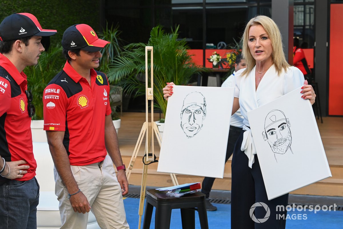 Charles Leclerc, Scuderia Ferrari, Carlos Sainz, Scuderia Ferrari, draw portraits of each other in the paddock overseen by Rachel Brookes, Sky TV 