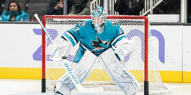 James Reimer of the San Jose Sharks takes reps during warmups at SAP Center March 11, 2023, in San Jose, Calif. 