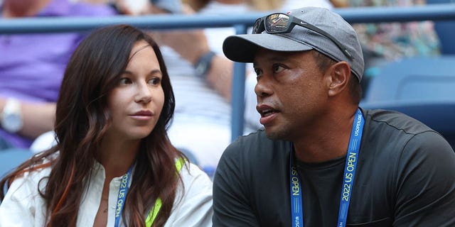 Erica Herman, left, and Tiger Woods look on prior to the Women's Singles Second Round match between Anett Kontaveit and Serena Williams on Day Three of the 2022 US Open at USTA Billie Jean King National Tennis Center on Aug. 31, 2022 in the Flushing neighborhood of the Queens borough of New York City.