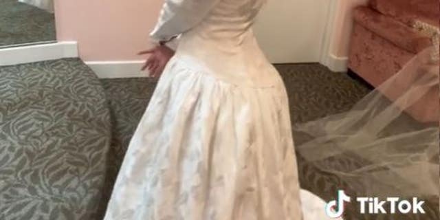 Williams is shown trying on her mother's long-sleeve wedding gown, which she later wore on her own wedding day. "I don't believe in a backup plan," she said of her lifestyle choice to focus solely on her husband.