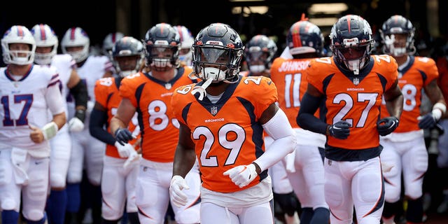 Faion Hicks #29 of the Denver Broncos runs to the field prior to a preseason game against the Buffalo Bills at Highmark Stadium on August 20, 2022 in Orchard Park, New York.