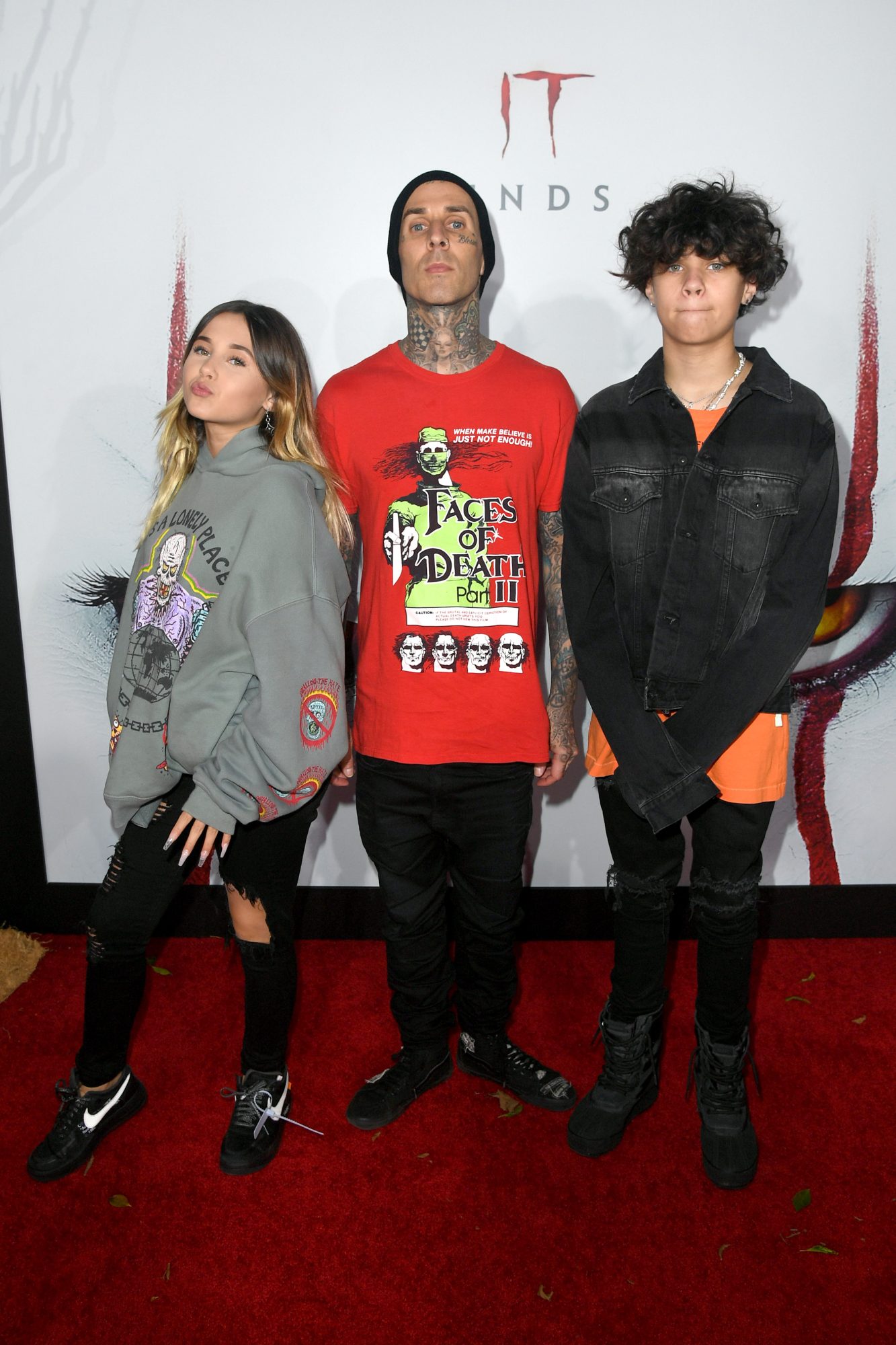 Blink-182 drummer Travis Barker pictured with daughter Alabama, 17, and son Landon, 19.