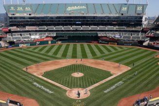 A’s fan storms field before game, runs the bases