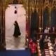 Cloaked figure runs past Westminster Abbey during coronation | Lifestyle | Independent TV - The Independent