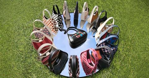 Coachtopia's line of Ergo Shoulder Bags on display atop a mirrored surface.