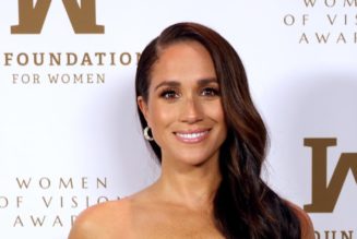 Meghan Markle’s Gold Strapless Cutout Dress Is One of her Boldest Looks Yet