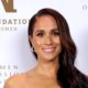 Meghan Markle’s Gold Strapless Cutout Dress Is One of her Boldest Looks Yet