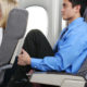 Is it OK to recline your airplane seat? Some travel experts say no.