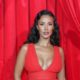 Maya Jama Shares a Peek of Her Silk Underwear in Plunging Red Dress