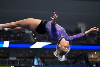 Olivia Dunne draws crowd while watching LSU at College World Series