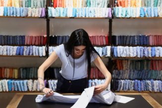 Italy's luxury groups set aside rivalries to keep it local