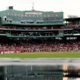 Red Sox fans take advantage of flooded Fenway Park during rain delay