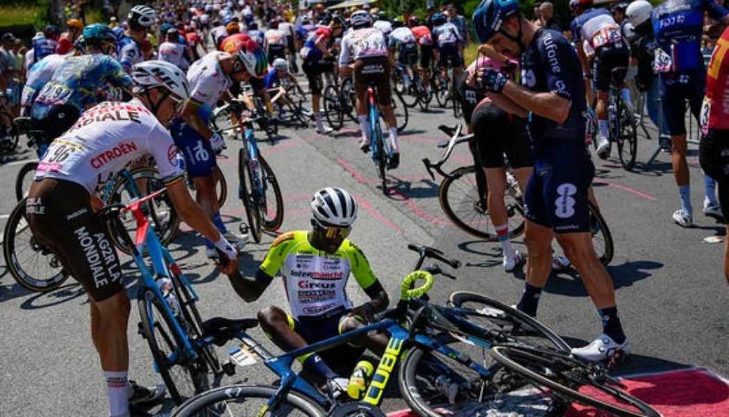 Tour de France spectator who allegedly 'wanted to get a selfie' causes massive crash