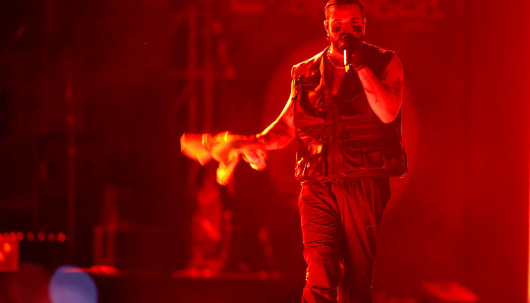 Drake Checks Fan After Throwing His Book At Him On Stage
