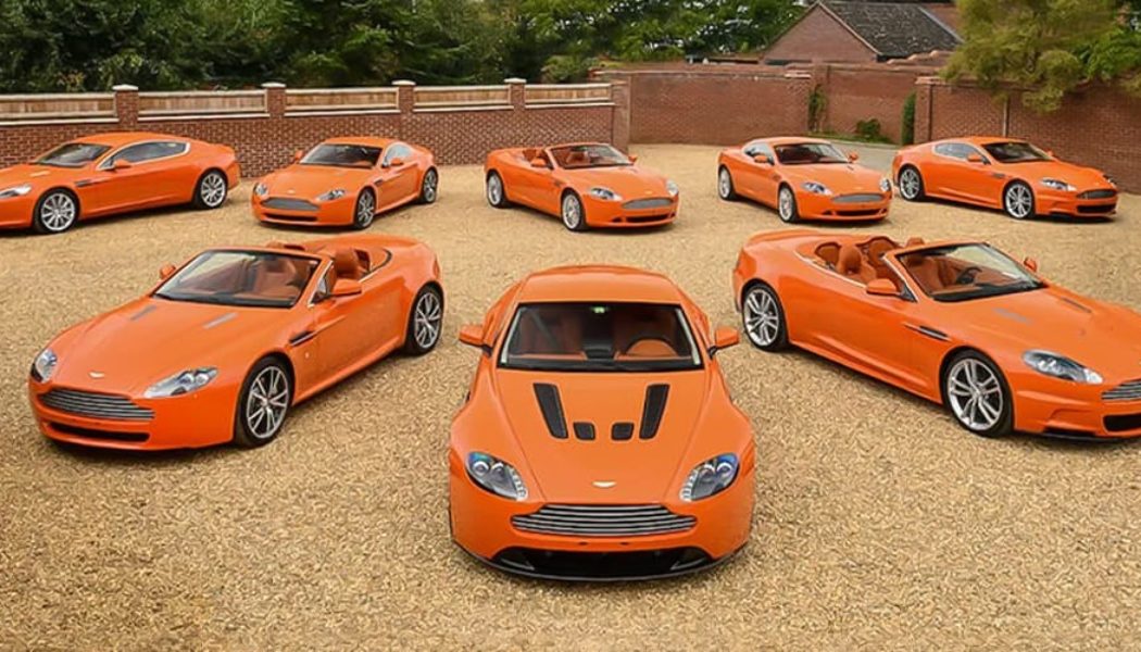 Collection of Eight Orange 2010 Aston Martins Are Heading to Auction