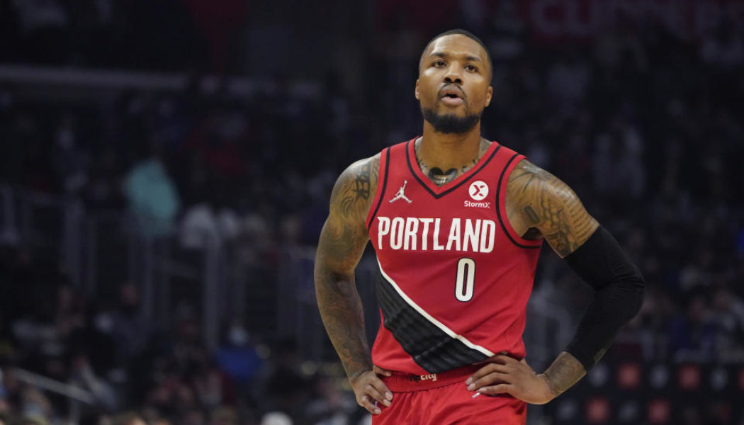 Report: Damian Lillard will report to training camp only in Miami or Portland
