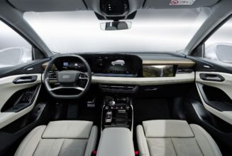 The Audi Q6 E-tron has three screens lighting up the entire dashboard