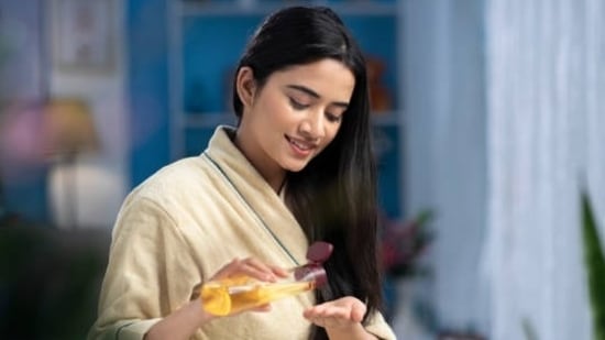 5. Oil your scalp to nourish hair: Hair fall can begin with age but can be handled with the right nutrients and oiling of your beautiful locks. (gettyimages)