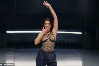 Dua Lipa wows in skimpy mesh vest in her new music video