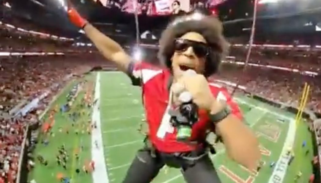 Ludacris performs "Move B***h" while descending from the roof of Atlanta Falcons' stadium