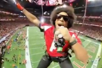 Ludacris performs "Move B***h" while descending from the roof of Atlanta Falcons' stadium