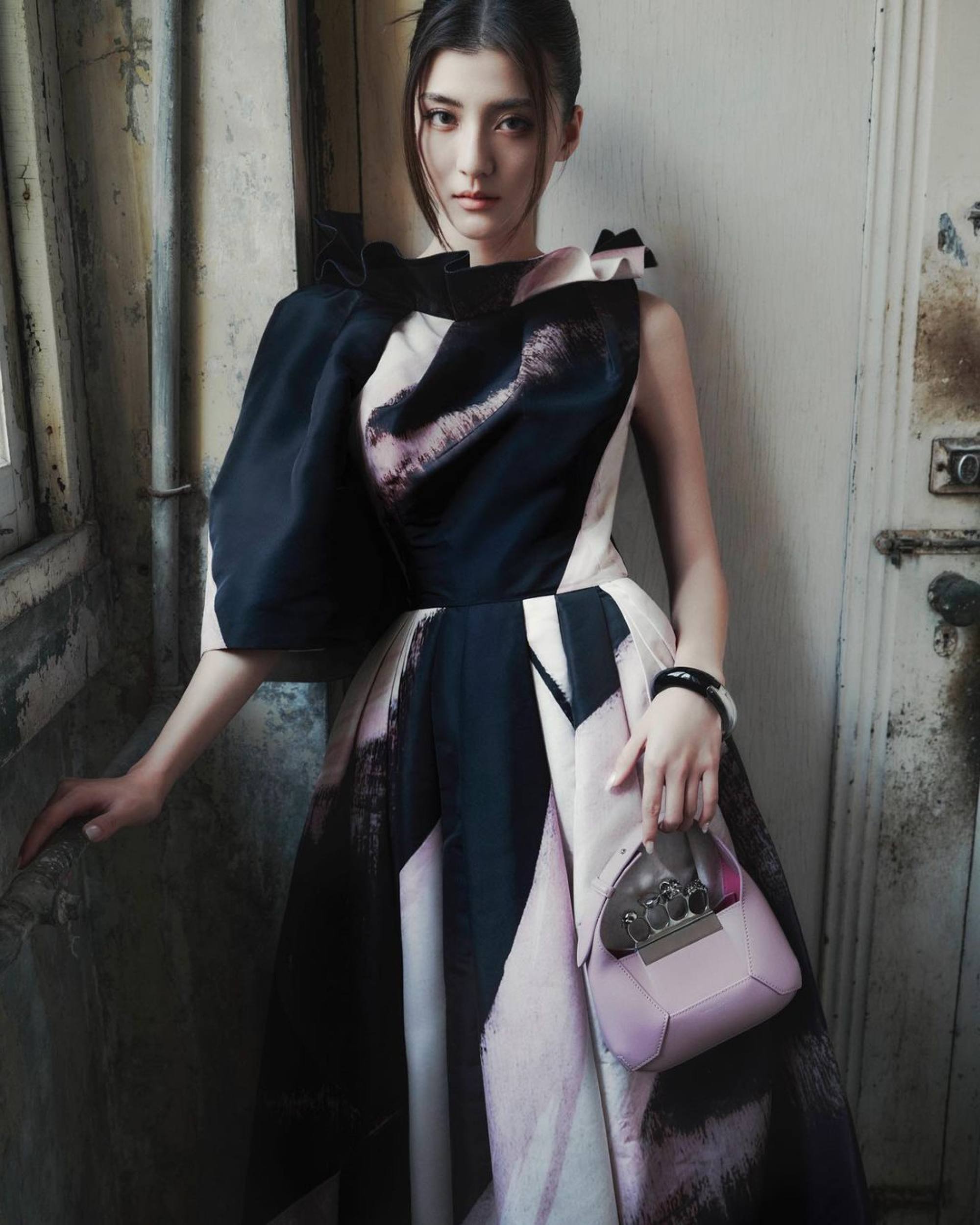Karena Ng channelling femme fatale vibes with this Alexander McQueen bag