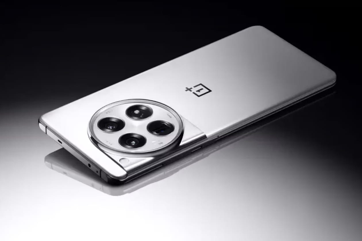 top tech news stories weekly roundup oneplus flaship smartphone amazon tranium 2 ai training chip axel arigato transparent speaker