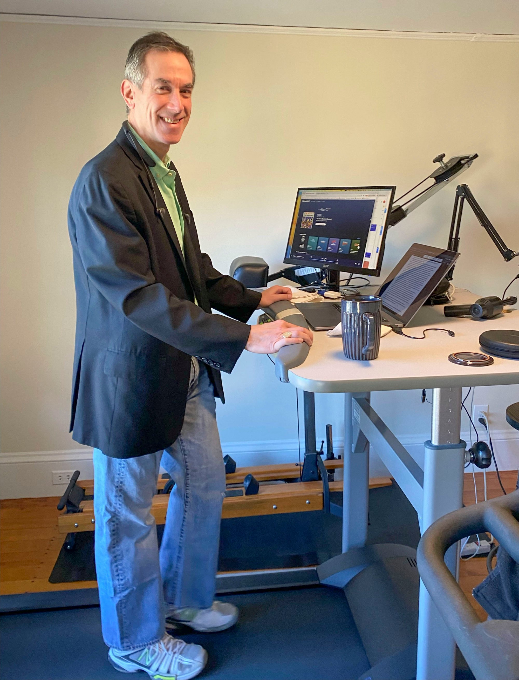 Neurology professor Andrew Budson keeps moving while working throughout the day on the walking station under his desk. Photo: Andrew Budson