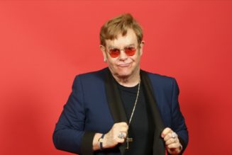 Elton John becomes 19th person to win EGOT