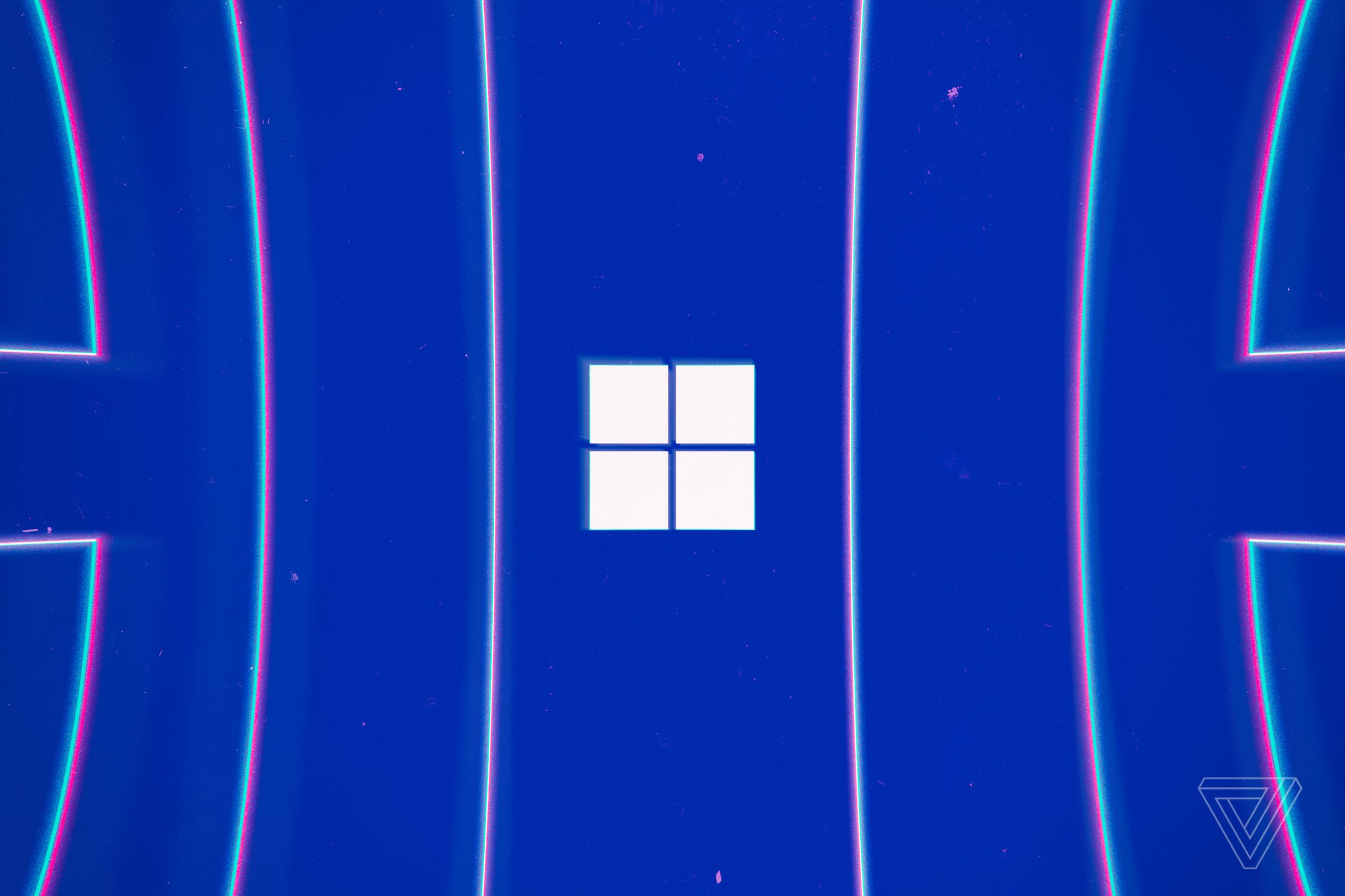 Windows logo on a blue background with several vertical lines flanking it.
