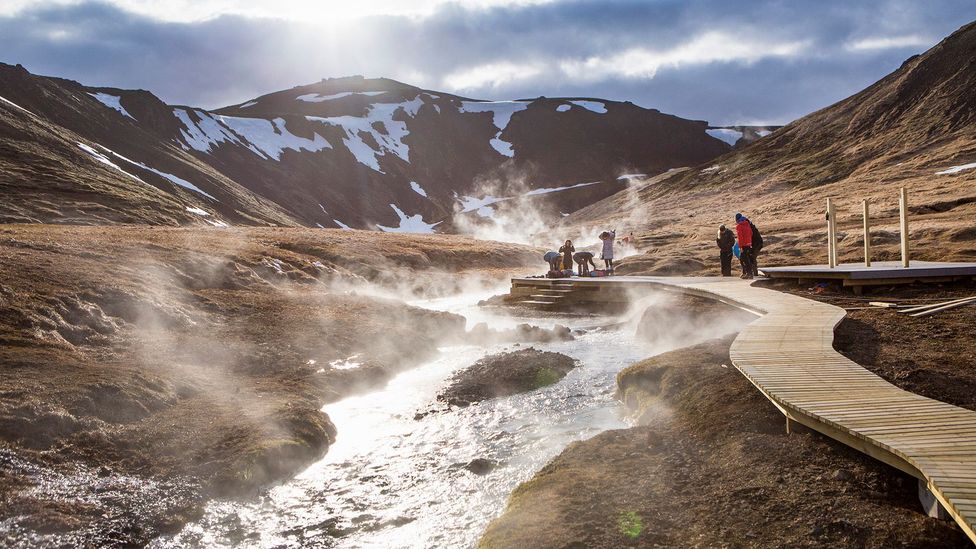 Iceland uses its tourist tax to fund infrastructure projects such as maintaining hiking paths near hot springs (Credit: Matthew Micah Wright/Getty Images)