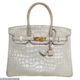 Two people are SUING Hermes over its tough-to-buy Birkin bags