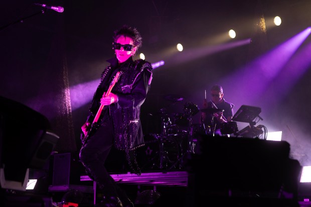 The band Tones on Tail performs during the Cruel World...