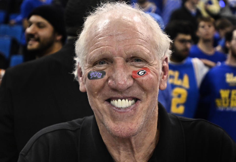 Los Angeles, CA - January 05: Two-time NBA champion and Hall of Famer Bill Walton has died of cancer at the age of 71. Former UCLA Bruins Bill Walton showing off his CFP Championship teams TCU and Georgia eye black stickers as the UCLA Bruins defeated the USC Trojans 60-58 during a Men's NCAA basketball game at Pauley Pavilion in Los Angeles on Thursday, January 5, 2023. (Photo by Keith Birmingham/MediaNews Group/Pasadena Star-News via Getty Images)