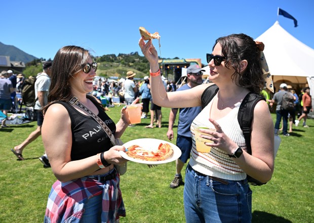 Friends Jenna Martin, left, and Lisa Roper of Sacramento have...